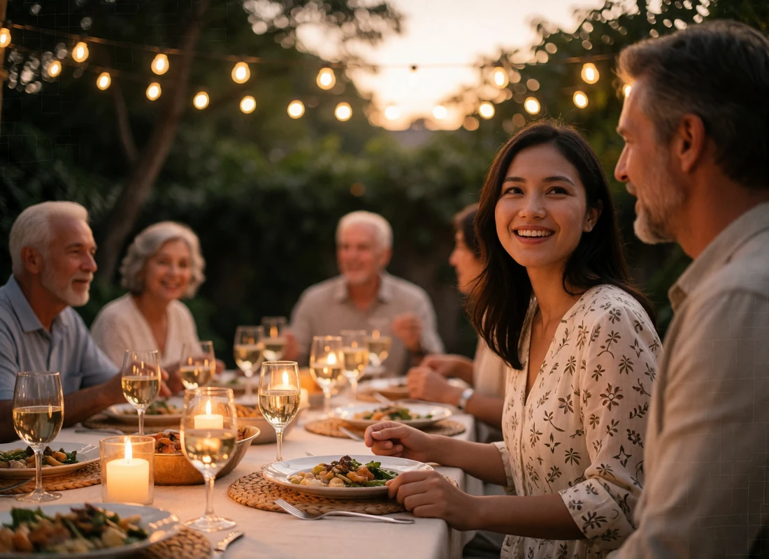 Filipina woman smiling beside a Western man at a warm outdoor family gathering under string lights